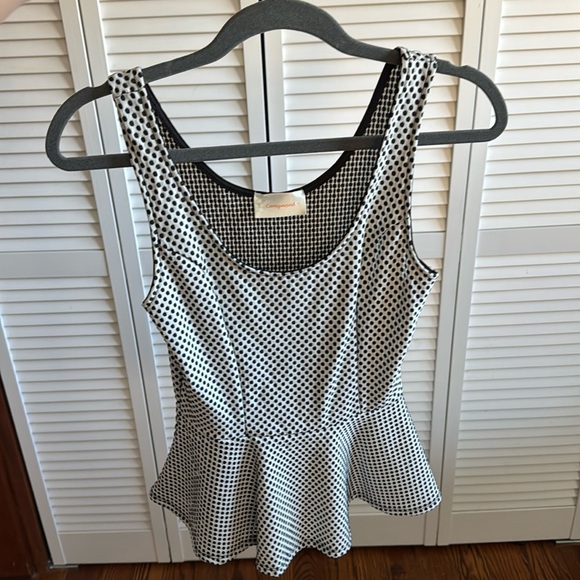 Stretchy white and. Lack polka dot peplum top - Picture 1 of 4